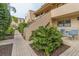 Exterior of property with walkway, stairway and seating at 4621 Gulf Of Mexico Dr # D10, Longboat Key, FL 34228