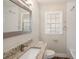 Updated bathroom features granite countertops, a new vanity, and a tiled shower at 4809 11Th S Ave, St Petersburg, FL 33711