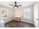 Charming bedroom with ceiling fan and wood-look flooring at 4809 11Th S Ave, St Petersburg, FL 33711
