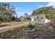 Gray house with yellow door, landscaped yard, and walkway at 4809 11Th S Ave, St Petersburg, FL 33711