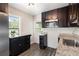 Updated kitchen featuring stainless steel appliances and granite countertops at 4809 11Th S Ave, St Petersburg, FL 33711