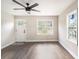 Bright living room with hardwood floors and ceiling fan at 4809 11Th S Ave, St Petersburg, FL 33711