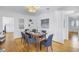 Modern dining area with hardwood floors and a rustic wood dining table at 605 16Th Ne Ave, St Petersburg, FL 33704