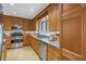 Modern kitchen with wood cabinets and granite counters at 605 16Th Ne Ave, St Petersburg, FL 33704