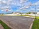 Community basketball court with benches for relaxing at 8624 Fantasia Park Way, Riverview, FL 33578