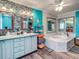 Spa-like bathroom with a large soaking tub and double vanity at 8624 Fantasia Park Way, Riverview, FL 33578
