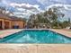 Relax by the refreshing community pool, complete with lounge chairs at 8624 Fantasia Park Way, Riverview, FL 33578