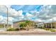 Single-wide manufactured home with carport and landscaping at 8624 Fantasia Park Way, Riverview, FL 33578