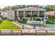 Charming manufactured home with a spacious covered porch and manicured lawn at 8624 Fantasia Park Way, Riverview, FL 33578