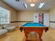Community game room with billiard table and seating at 8624 Fantasia Park Way, Riverview, FL 33578