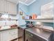 Laundry room with washer, dryer, and utility sink at 8624 Fantasia Park Way, Riverview, FL 33578