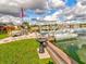 Peaceful waterfront view with dock and boat at 8624 Fantasia Park Way, Riverview, FL 33578