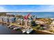 Aerial view of waterfront property with boat slips and private docks at 907 Bahia Del Sol Dr, Ruskin, FL 33570