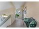 Small balcony with bench, offering a view of the surrounding area at 907 Bahia Del Sol Dr, Ruskin, FL 33570