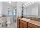 Updated bathroom with granite vanity and shower at 907 Bahia Del Sol Dr, Ruskin, FL 33570