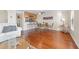 Bright dining area with hardwood floors and kitchen bar at 907 Bahia Del Sol Dr, Ruskin, FL 33570