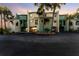 Two-story building exterior, showcasing a waterfront home at 907 Bahia Del Sol Dr, Ruskin, FL 33570