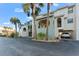 Two-story building exterior with covered parking at 907 Bahia Del Sol Dr, Ruskin, FL 33570