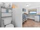 Laundry room with toilet and storage at 907 Bahia Del Sol Dr, Ruskin, FL 33570