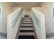 Exterior stairs with railings leading to a waterfront condo at 907 Bahia Del Sol Dr, Ruskin, FL 33570