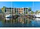 Building with water access, multiple boat slips and beautiful reflection at 907 Bahia Del Sol Dr, Ruskin, FL 33570