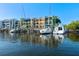 Sailboats docked at waterfront property; serene water view at 907 Bahia Del Sol Dr, Ruskin, FL 33570