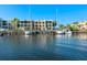 Waterfront property with boats docked, offering stunning water views at 907 Bahia Del Sol Dr, Ruskin, FL 33570