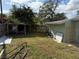 Backyard with shed, fence, and bike storage at 10002 Memorial Hwy, Tampa, FL 33615