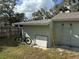 Backyard with shed, ladder, and bicycle at 10002 Memorial Hwy, Tampa, FL 33615