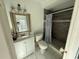 Bathroom with a vanity, toilet, and shower at 10002 Memorial Hwy, Tampa, FL 33615