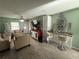 Living room with a home bar and seating area at 10002 Memorial Hwy, Tampa, FL 33615