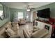 Living room features a Christmas tree and comfy seating at 10002 Memorial Hwy, Tampa, FL 33615