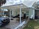 Home exterior featuring a covered patio area at 10002 Memorial Hwy, Tampa, FL 33615