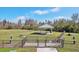 Dog park with fenced area, benches, and shelter at 10347 Heron Hideaway Loop, Land O Lakes, FL 34638