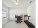 Home office with a large desk and two monitors at 10347 Heron Hideaway Loop, Land O Lakes, FL 34638