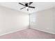 Spacious bedroom with ceiling fan and neutral walls at 11839 Lake Blvd, New Port Richey, FL 34655