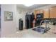 Well-equipped kitchen featuring modern appliances and a convenient water cooler at 12827 Buffalo Run Dr, Gibsonton, FL 33534