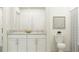 Bathroom with double vanity, granite countertop, and shower at 13629 Newbridge St, Spring Hill, FL 34609