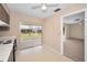 Kitchen with access to living room and patio at 1518 W Dorchester Dr, Palm Harbor, FL 34684