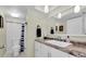 Clean bathroom with granite countertop and updated fixtures at 19029 Us Highway 19 N # 8-25, Clearwater, FL 33764