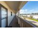 Building hallway with access to condo units and an outside view at 19029 Us Highway 19 N # 8-25, Clearwater, FL 33764