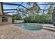 Inviting screened pool and spa with brick pavers at 2503 Centennial Falcon Dr, Valrico, FL 33596