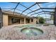 Relaxing screened pool and spa with patio at 2503 Centennial Falcon Dr, Valrico, FL 33596