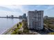 Aerial view of high-rise building near waterfront, showcasing its location at 2611 Bayshore Blvd # 506, Tampa, FL 33629