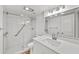 Modern bathroom with a walk-in shower, quartz vanity, and updated fixtures at 2611 Bayshore Blvd # 506, Tampa, FL 33629