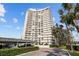 High-rise building with parking and lush landscaping at 2611 Bayshore Blvd # 506, Tampa, FL 33629