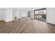 Living room with hardwood floors and balcony access at 2611 Bayshore Blvd # 506, Tampa, FL 33629