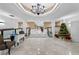 Elegant lobby with high ceilings, chandelier, and festive decor at 2611 Bayshore Blvd # 506, Tampa, FL 33629