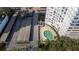 Elevated view of a resort-style pool and parking structure at 2611 Bayshore Blvd # 506, Tampa, FL 33629