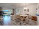 Bright dining area with a round table and four chairs at 3743 Teeside Dr, New Port Richey, FL 34655